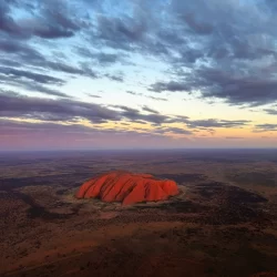 An aerial view of Uluru Ayers Rock from above at Sunset, mesmerising